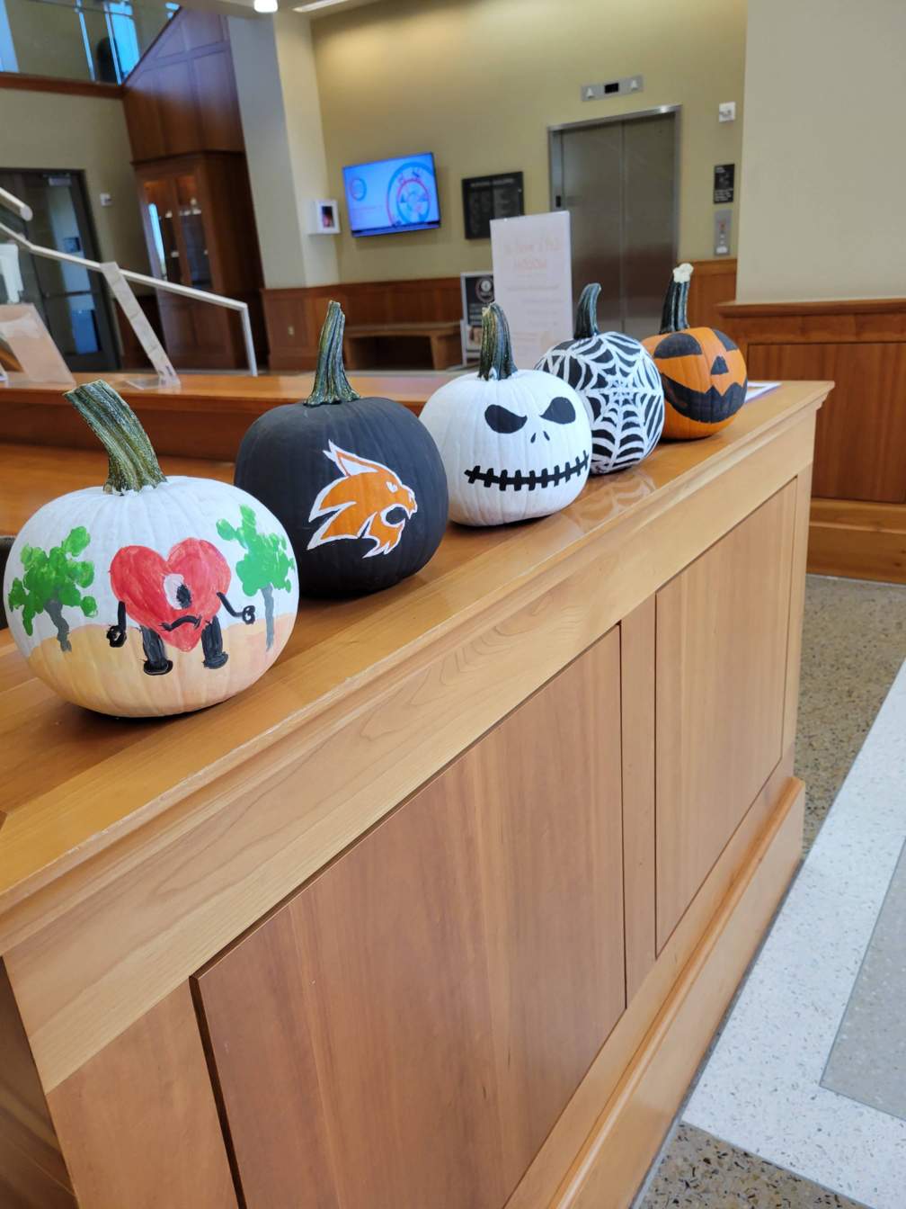 Painted pumpkins on the desk at Nursing Building