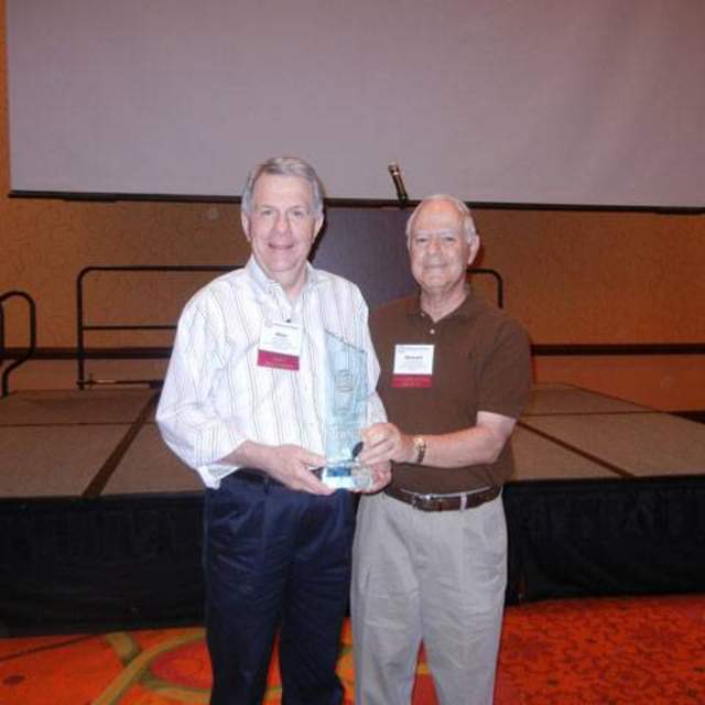 Mike Eastland, Executive Director of the North Central Texas Council of Governments (left) with Dr. Howard Balanoff displays a plaque he received for 40 years of service to the Texas City Management Association (TCMA). Mike Eastland was one of Dr. Balanoff’s first students in the Texas State University MPA Program and was an early graduate of the Program.