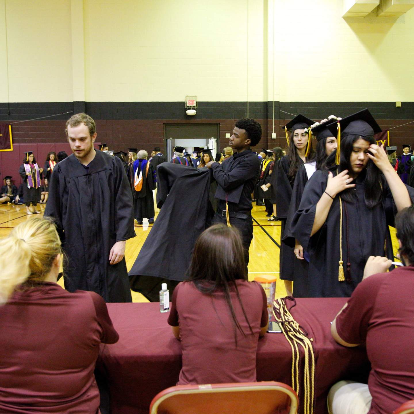 Graduation candidates check in before the Spring 2016 Texas State University commencement ceremonies.