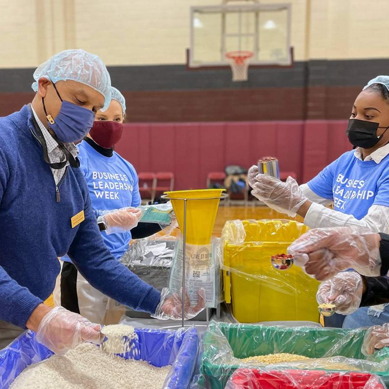 Dean Ramchander packing meals with students
