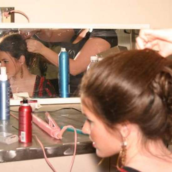 FM student getting her hair done before the 2007 show.