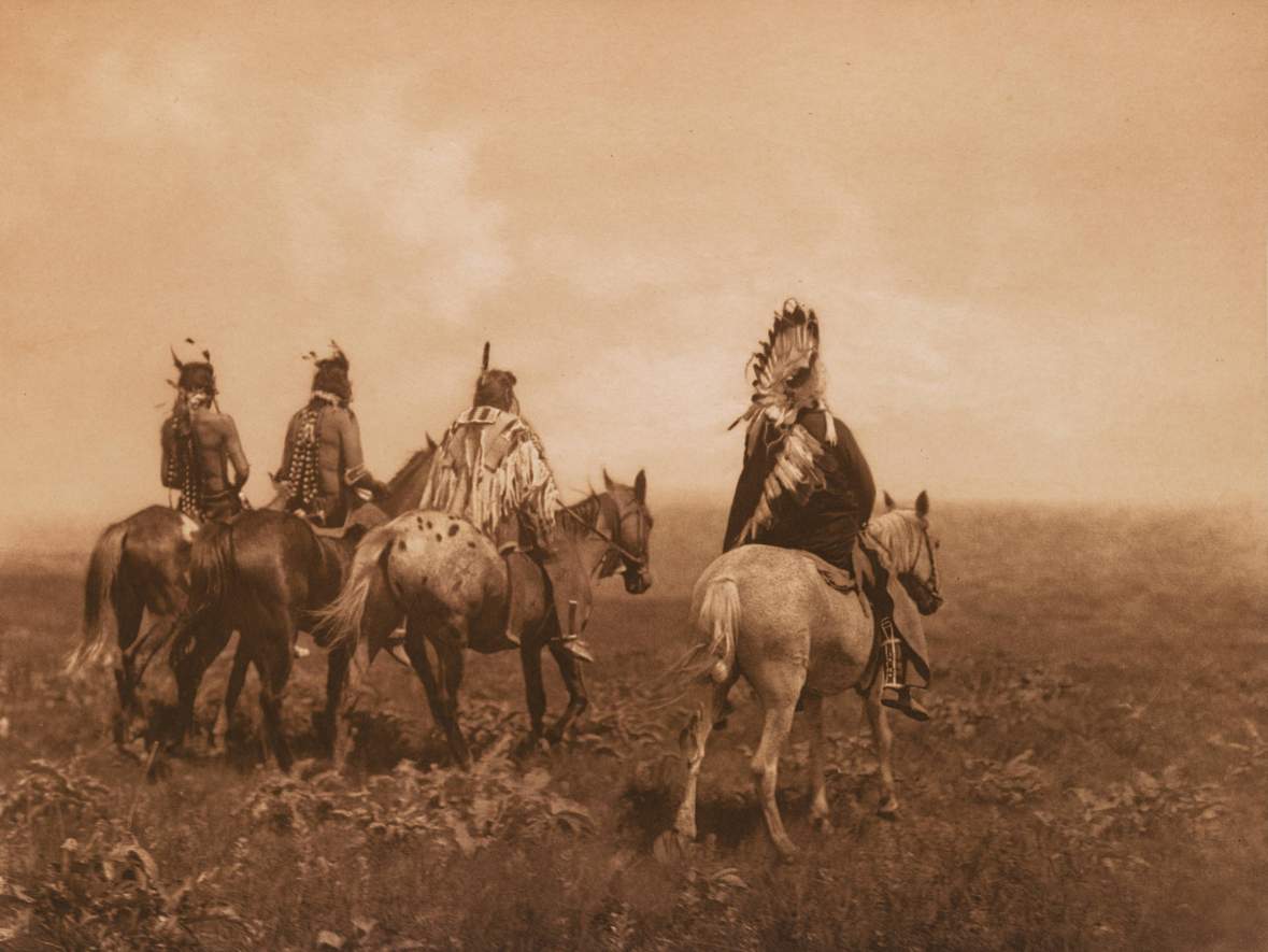 The Chief and His Staff -- Apsaroke by Edward S. Curtis, 1905, published 1909 