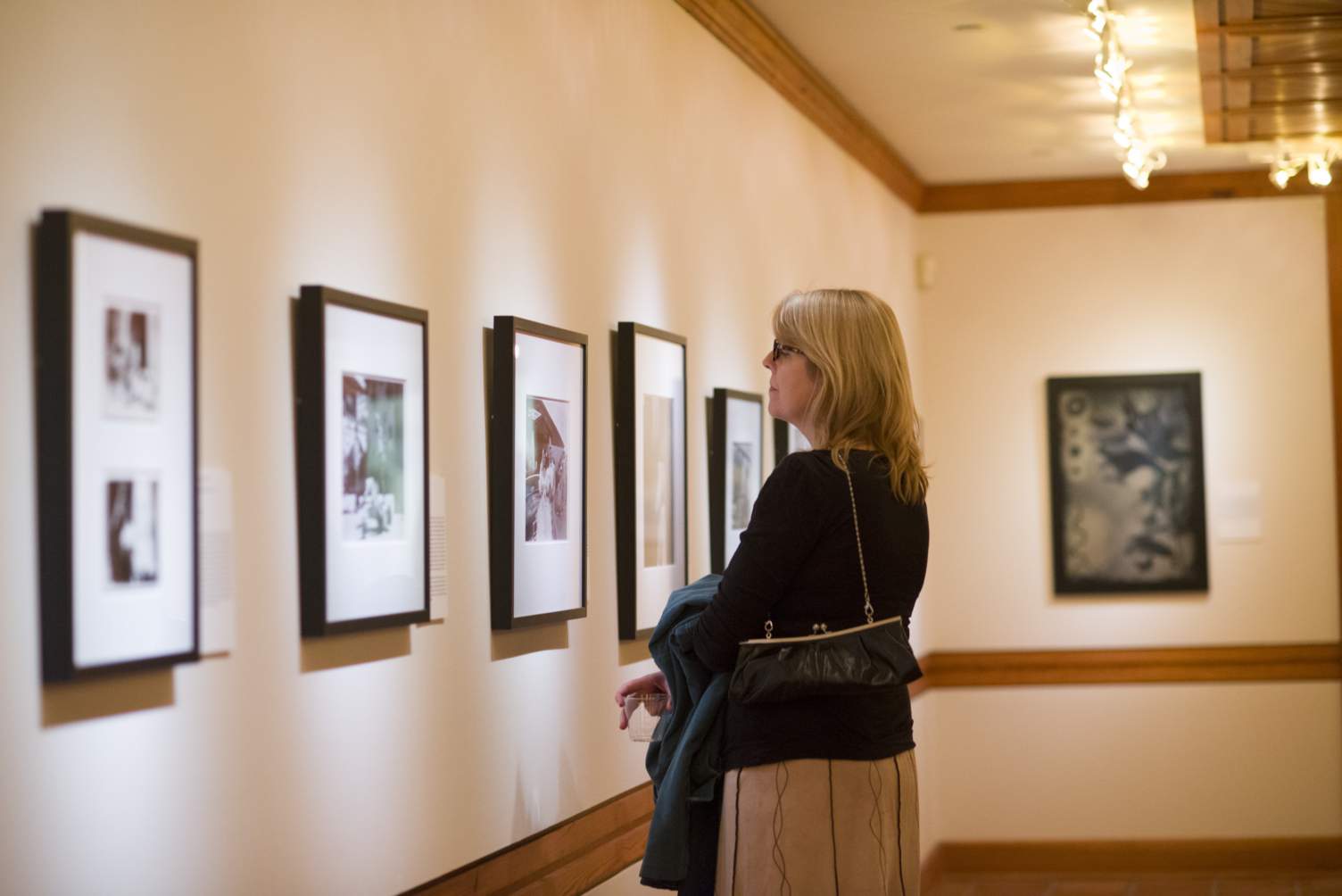 woman looking at exhibitions