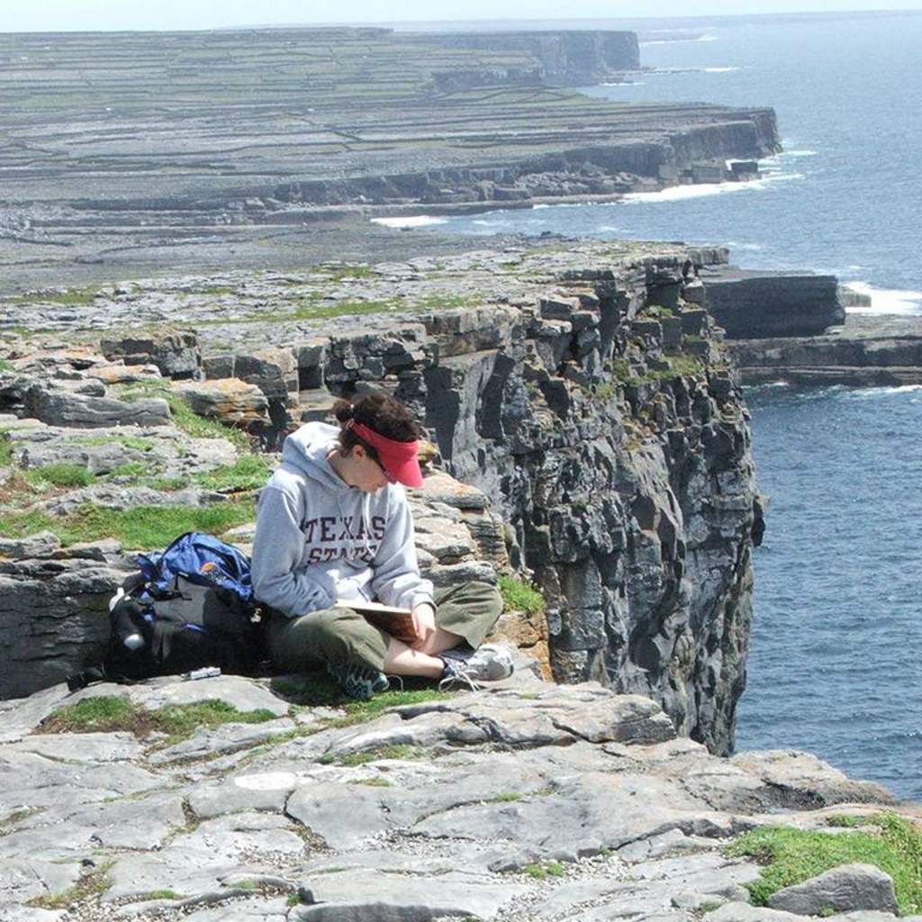 Student at Dun Aengus on the Aran Island of Inis Mor