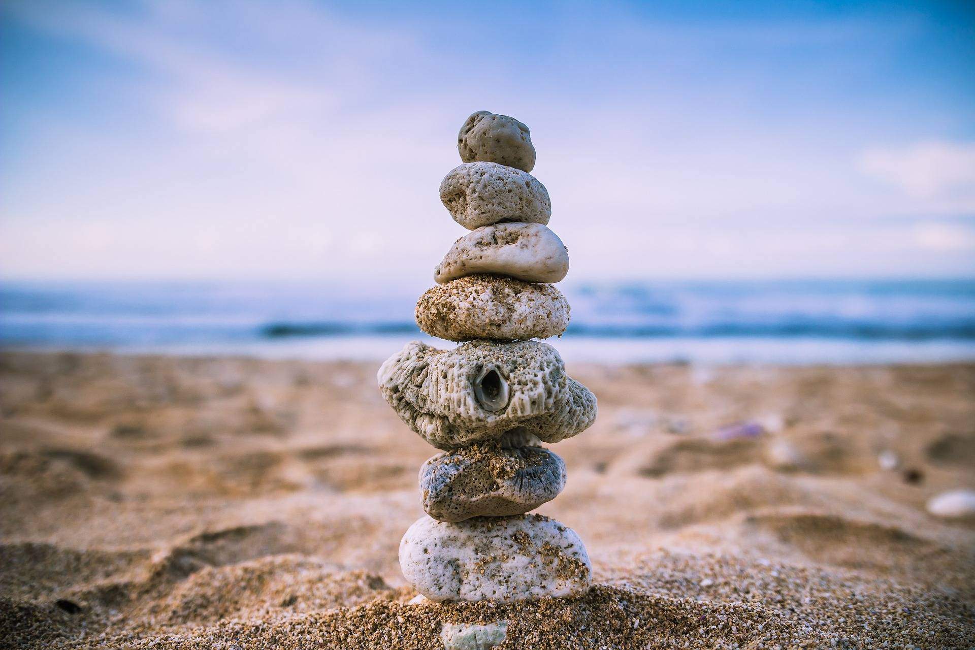 rocks stacked on an ocean shore