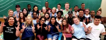 Nina Vaca with a classroom full of Texas State Students