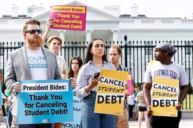 students rallying for student loan debt cancellation