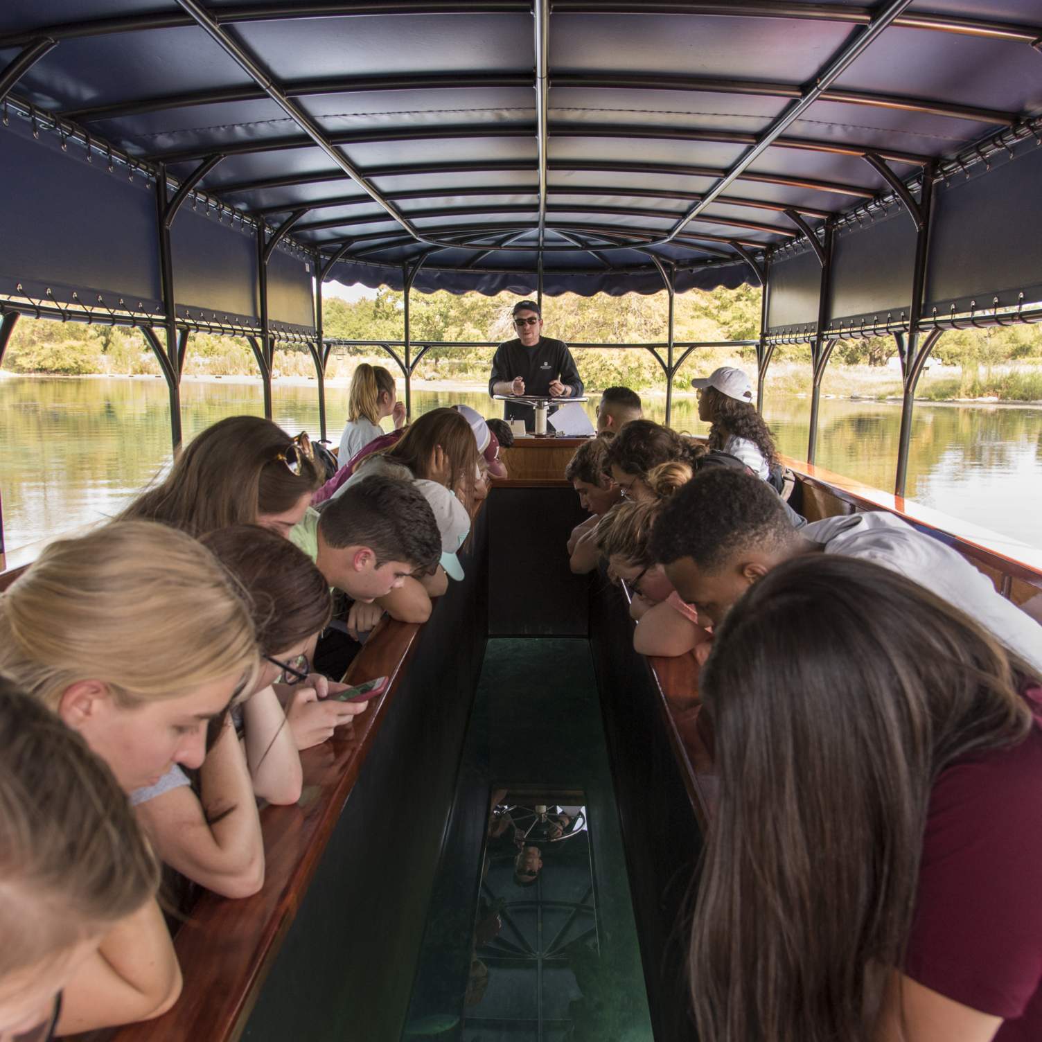 many students view glass bottom boats on tour