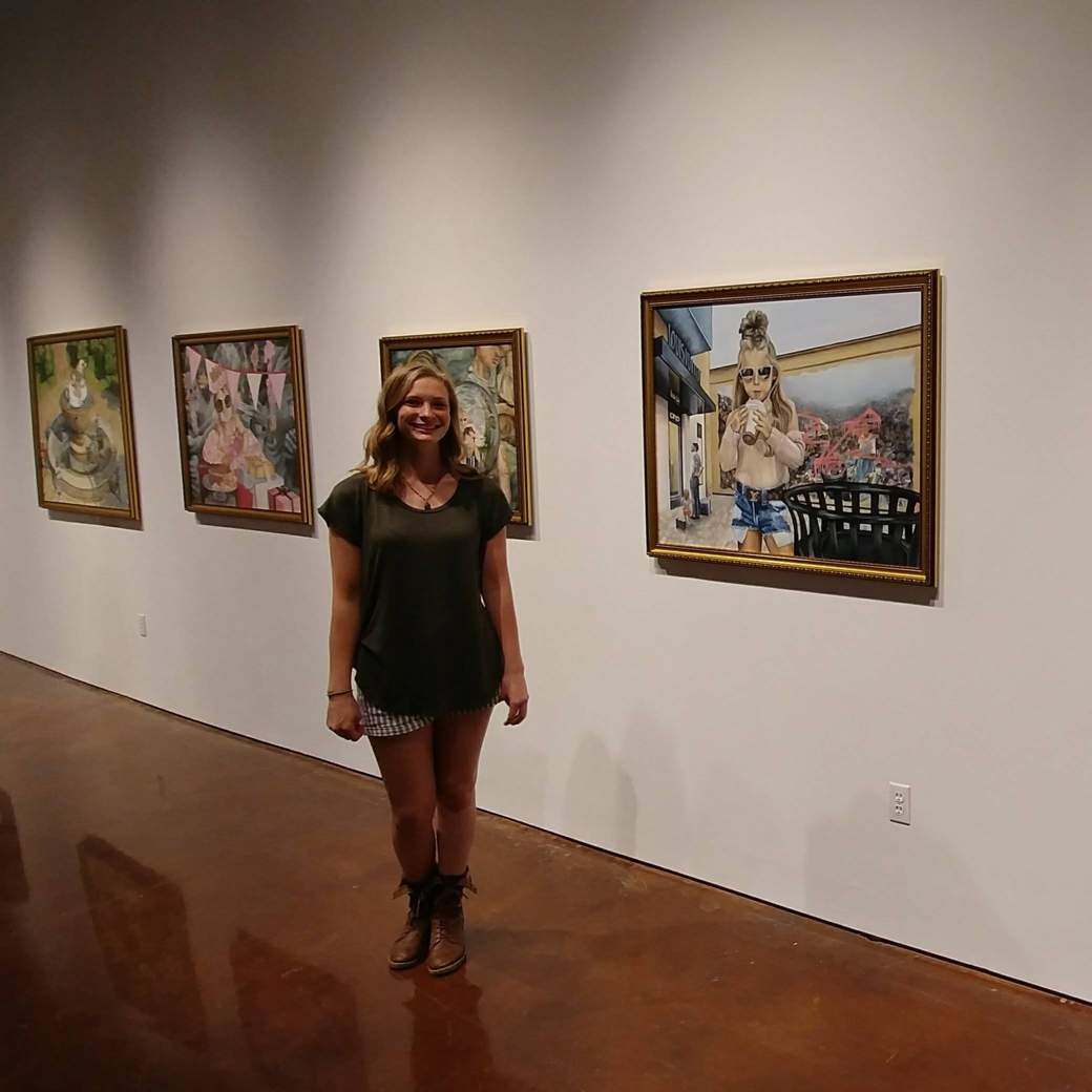 Morgan Jones exhibiting her Honors Thesis paintings