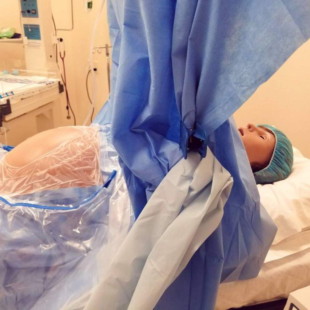 manikin having c-section surgery