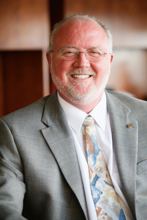 Professional profile picture of Mark Hughes, associate VP for Technology Resources