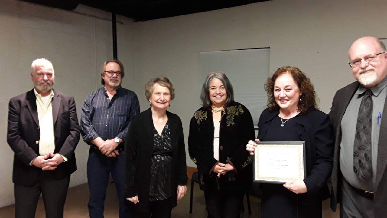 Board Member Honored at Reception