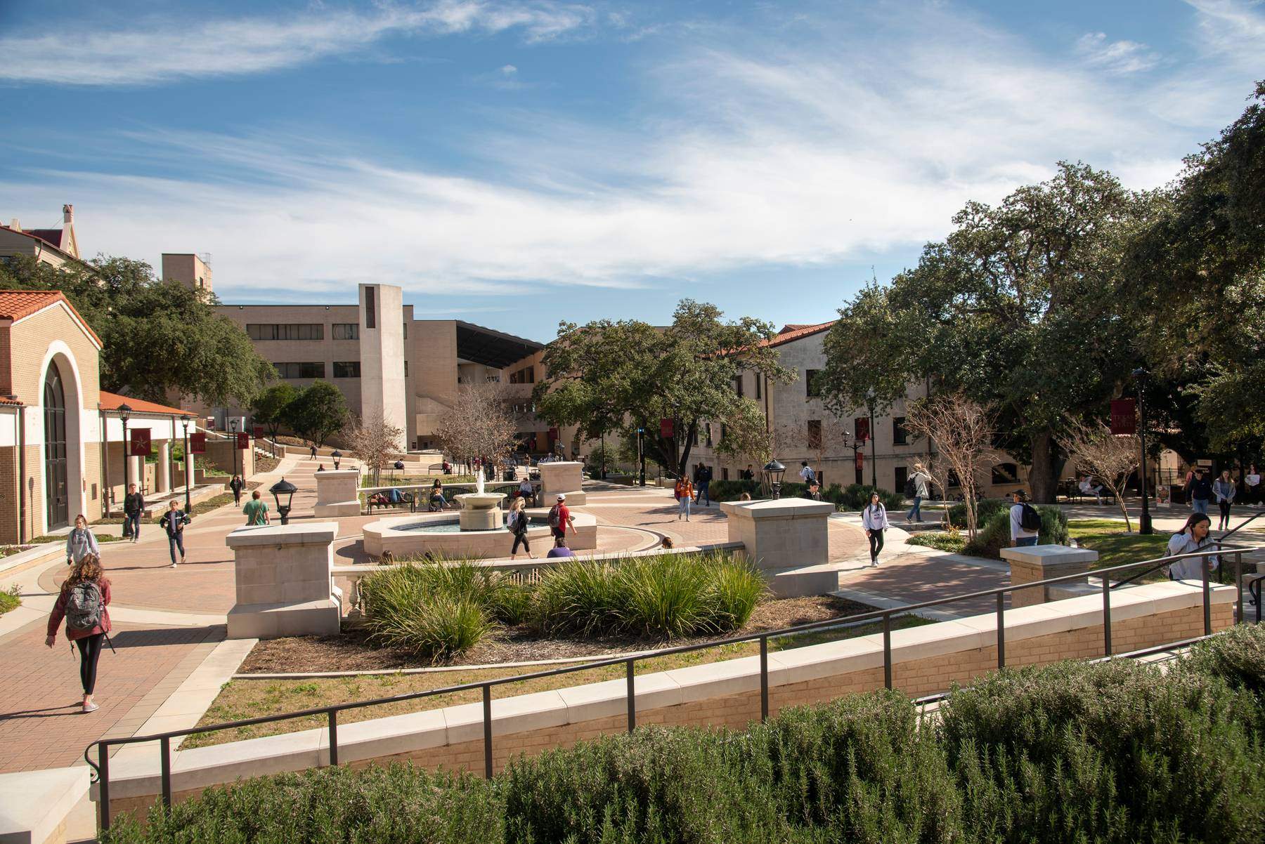 Exterior of bobcat trail looking towards the fountain with the North and South Academic Services Buildings in the background, and the Commons Dining hall to the right.