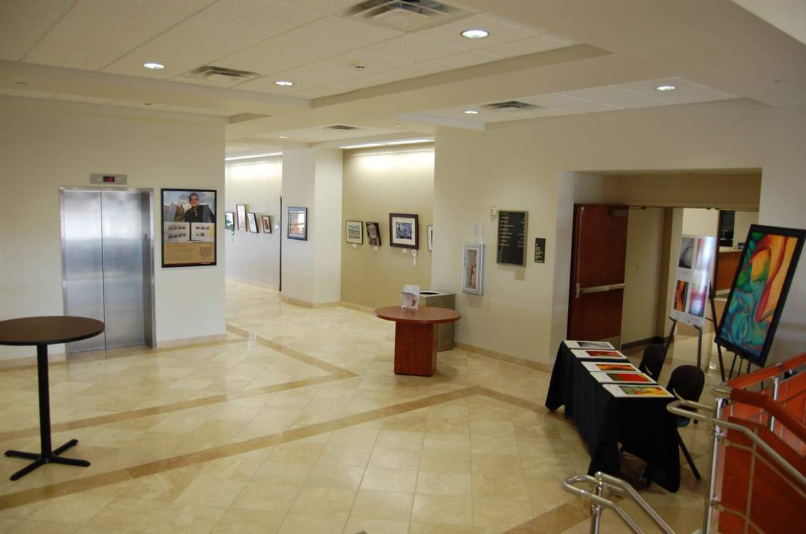 Hallway with artwork on the walls