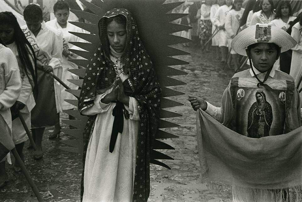Photo of girl dressed as Our Lady of Guadalupe in parade