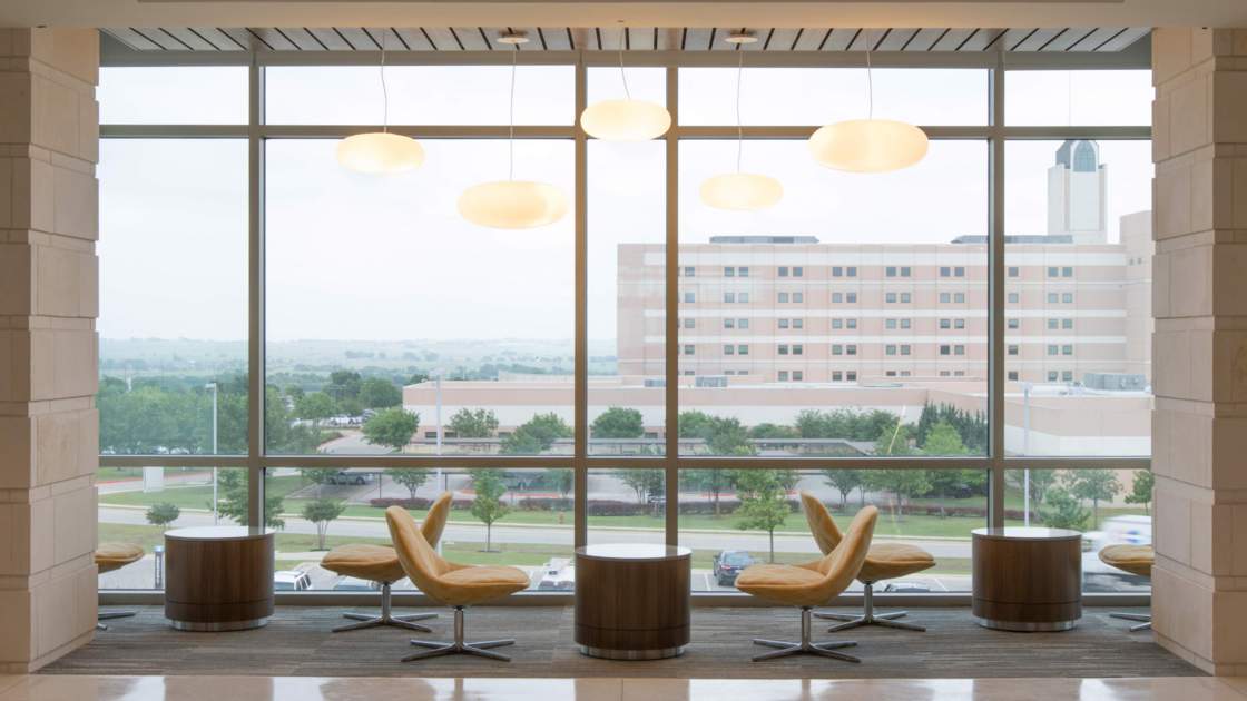 a study area is situated in front of a tall window overlooking another Round Rock medical building