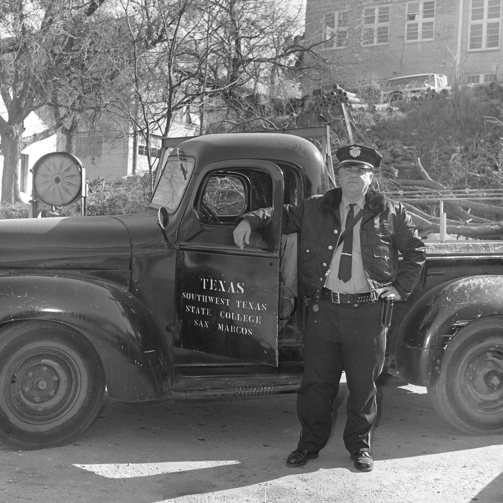 patrol officer Martin Randow poses with an old 1942 international truck