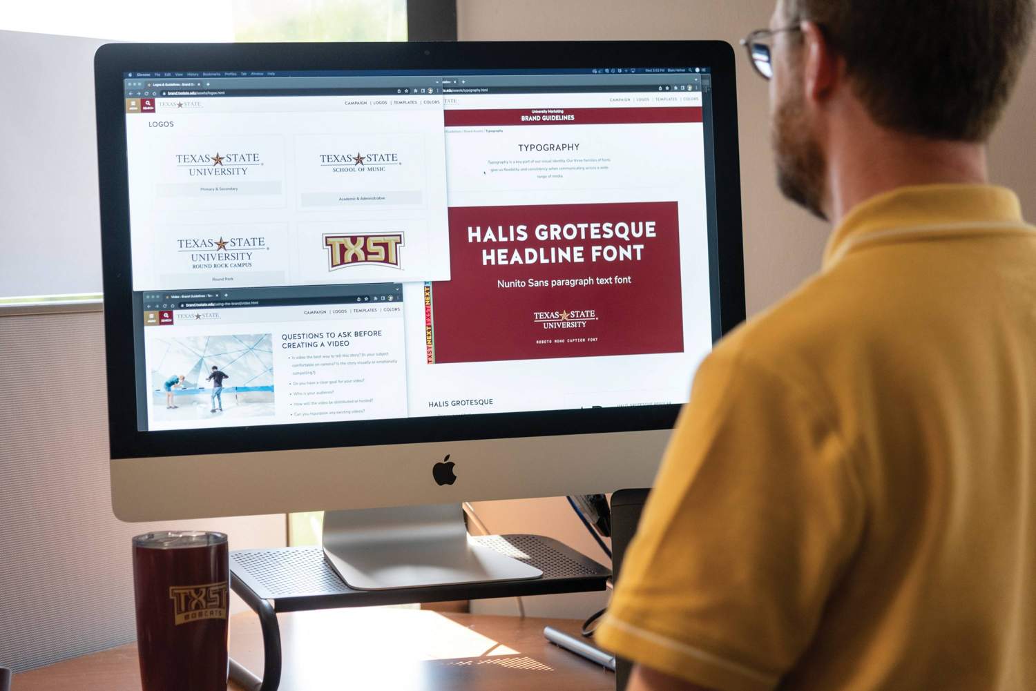 A staff member reviews the rules and resources on Texas State’s Brand Guidelines website.
