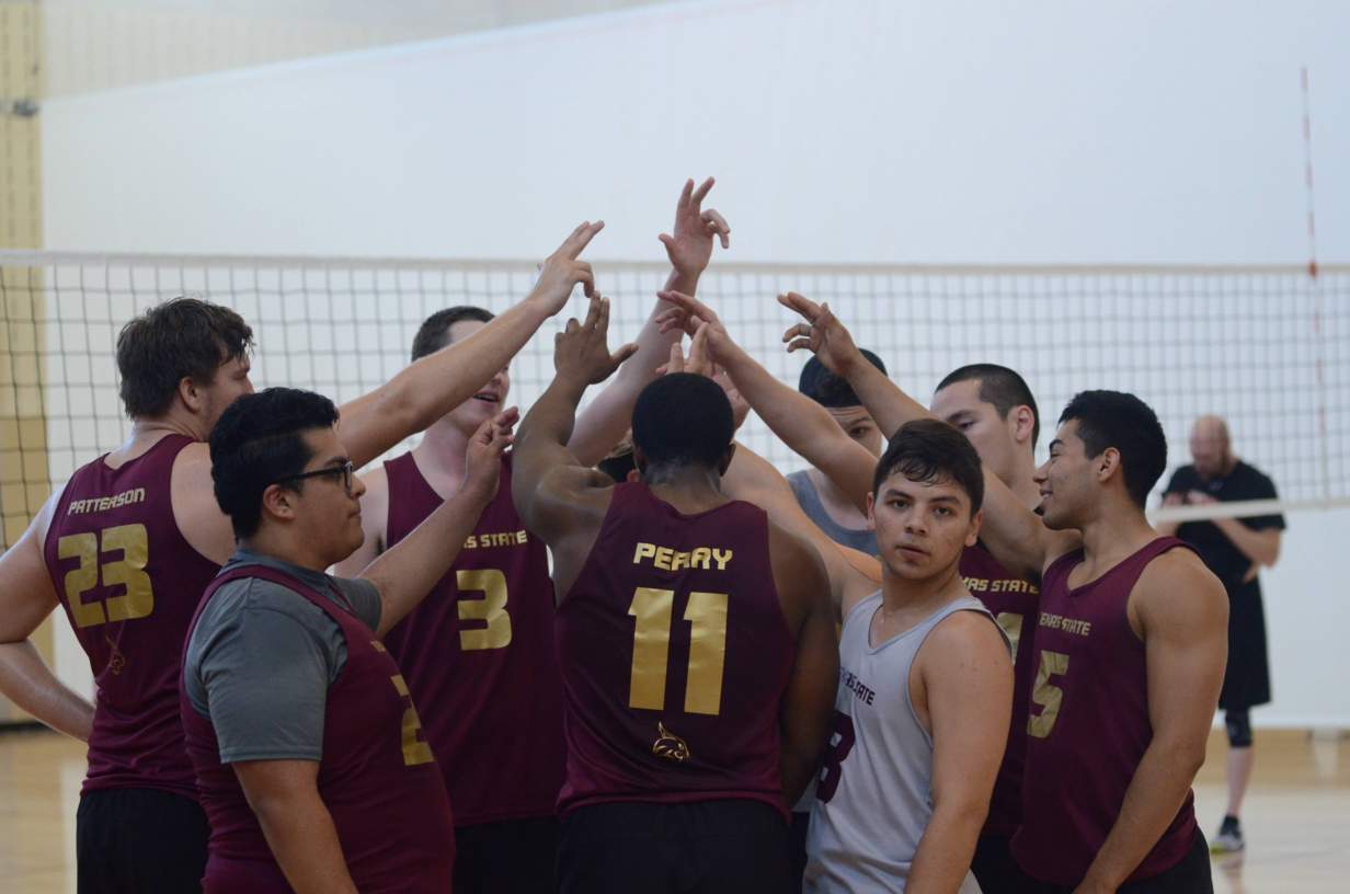 Men's Volleyball huddle