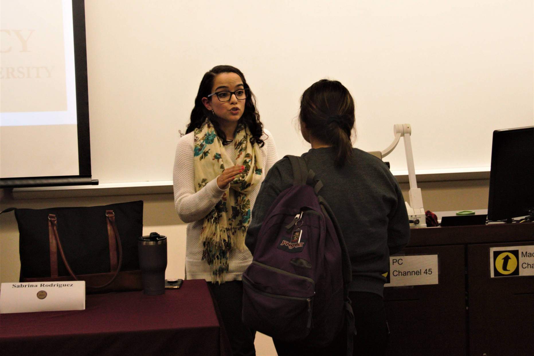 Students talking with alumni