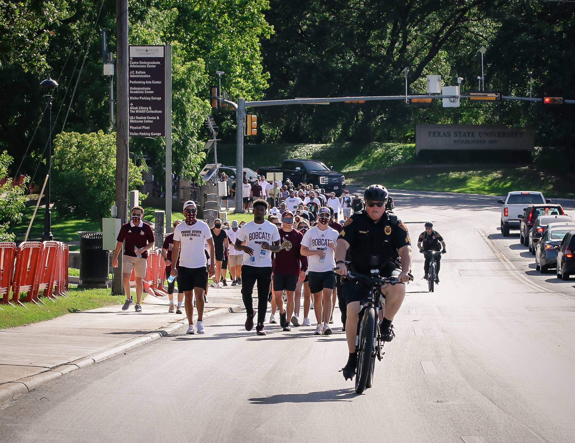 Officer Sue on Bike Patrol During Unity March 