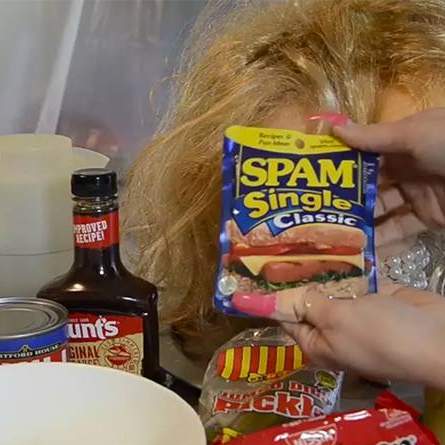 Student work: video still of hands holding a can of Spam