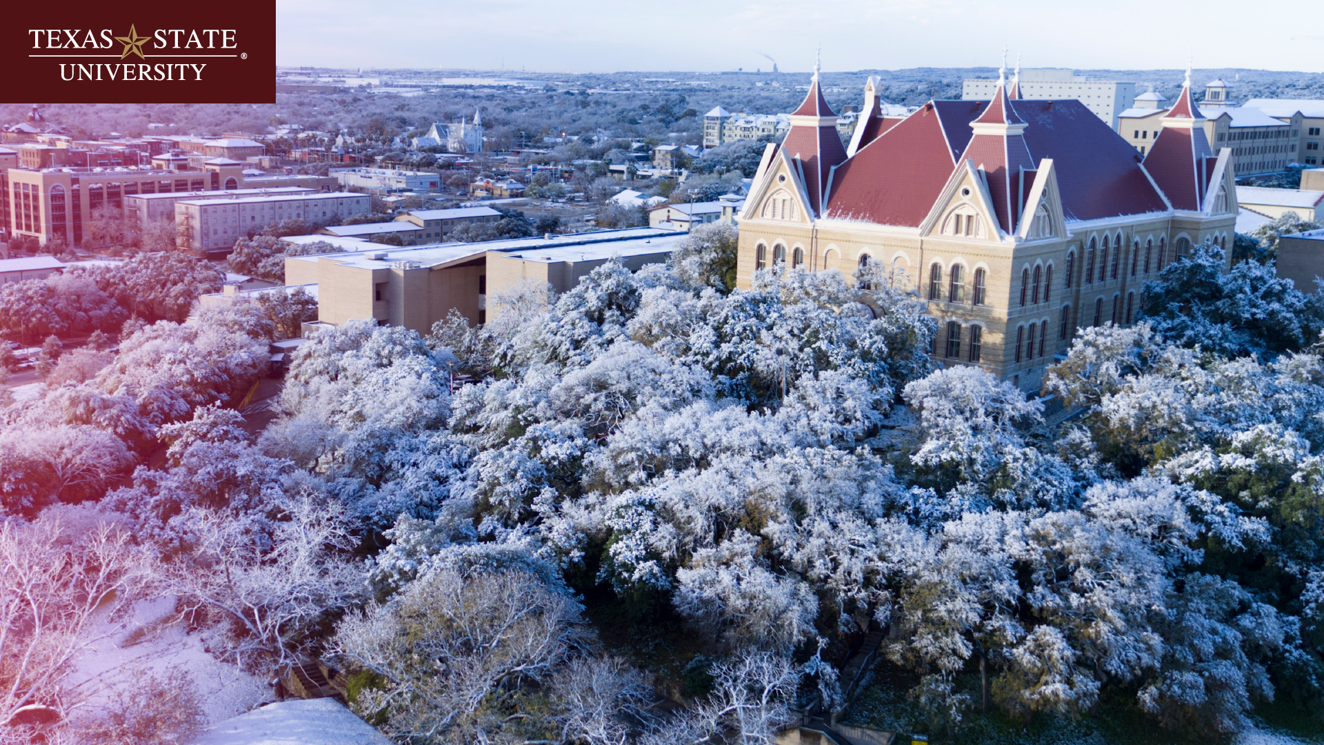 Aerial of Old Main in the snow