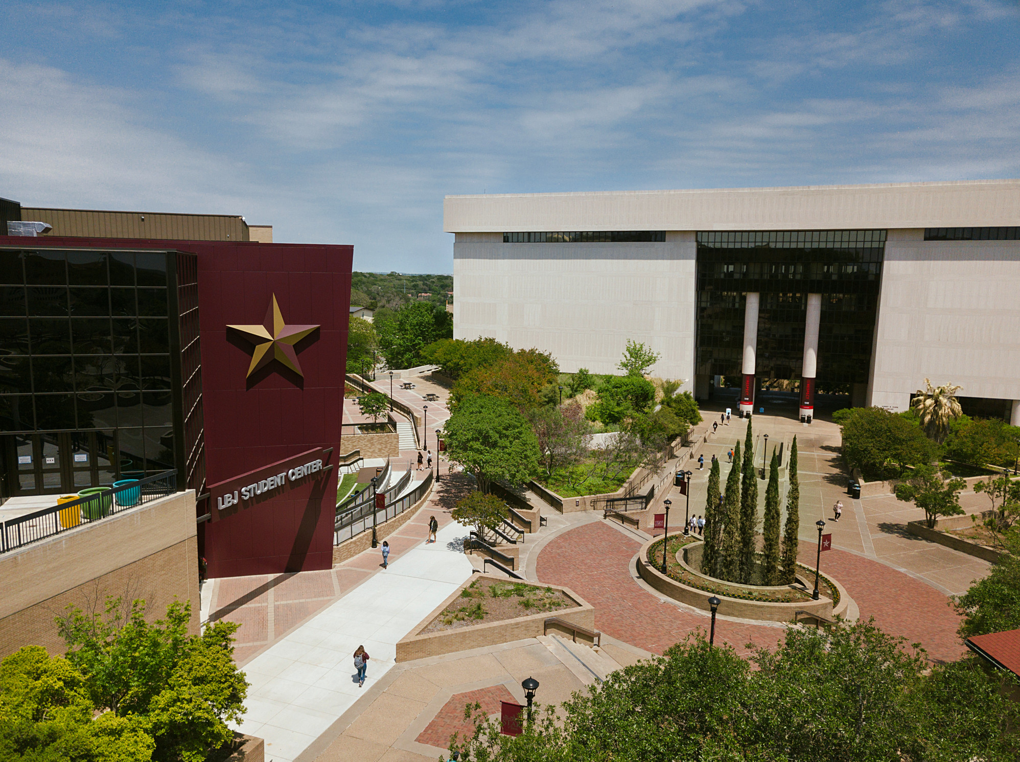 sunny day view of LBJ Stucent Center and Alkek Library on the TXST campus