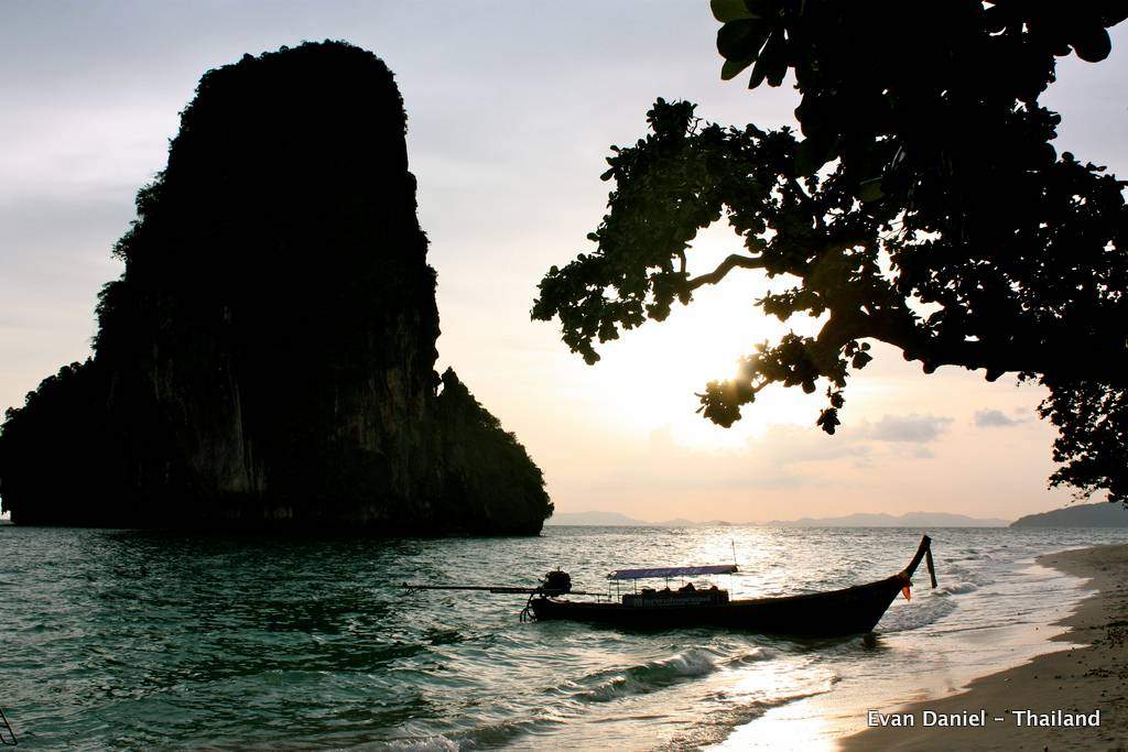 Small boat on the shore of a beach in Thailand taken by student Evan Daniel