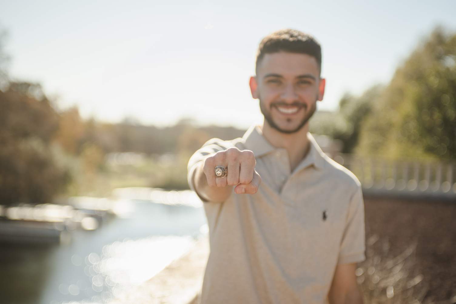 TXST male student showing his ring