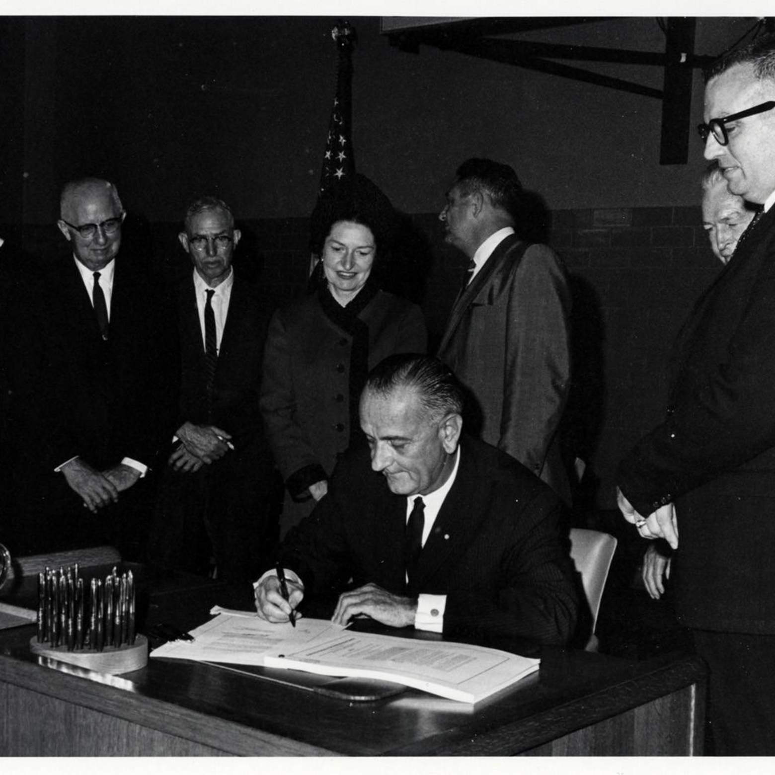 lbj signing the higher education act