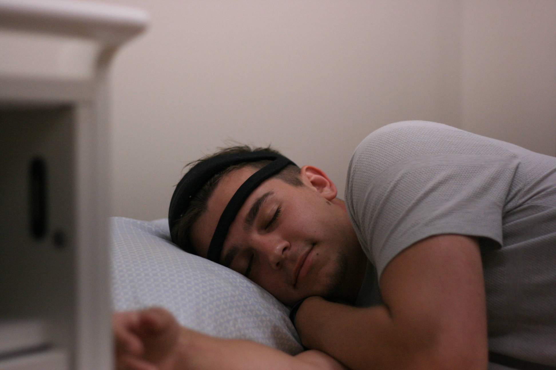 2.	Undergraduate research assistant in Dr. Westerberg’s lab, Gage Smith, demonstrates how to sleep while wearing the sleep recording headband. 